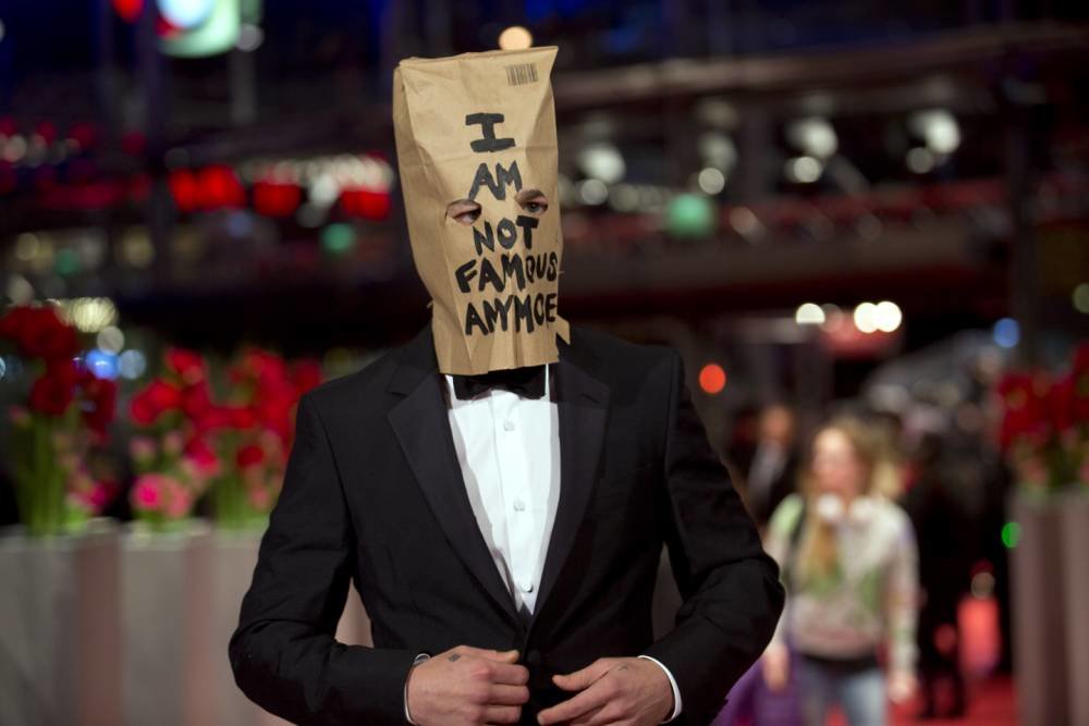 Shia LaBeouf with the infamous bag on his head from #IAMSORRY (2011) (AP Photo/Axel Schmidt)