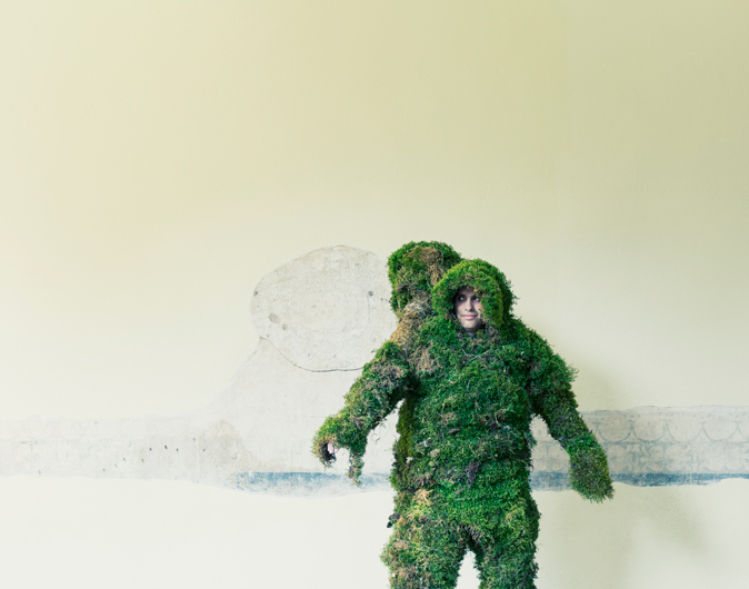 Man dressed in a suit of moss. The Moss Men of Bejar.