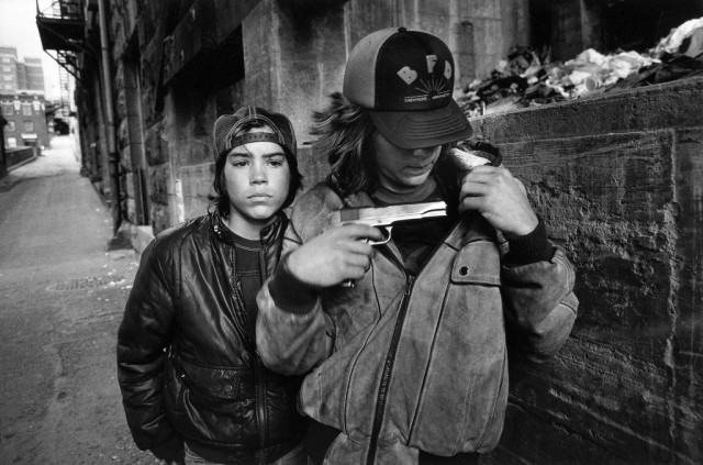 Rat and Mike with a Gun,Seattle, Washington, (1983), Mary Ellen Mark
